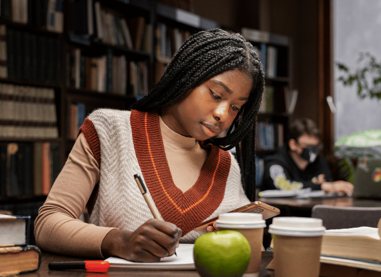 Female Student in a library