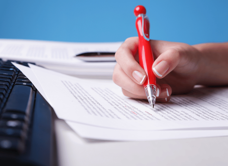 A man signing a document